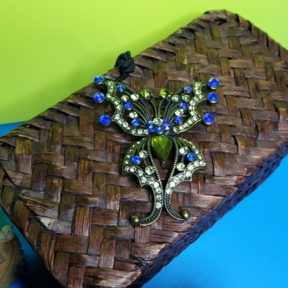 Antique goldtone butterfly brooch with rhinestones.